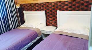 Гостиница Байкал Хан Ольхон Хужир Двухместный номер с 2 отдельными кроватями и видом на озеро-2